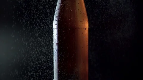 A misted bottle spraying with water Stock Footage 124292824