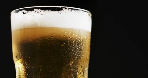Misted glass with cold light beer 스톡 동영상 88091687