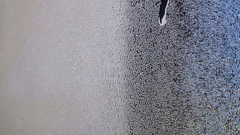 Misted glass of window with water drops falling down Selective focus. Stock Footage 126497019
