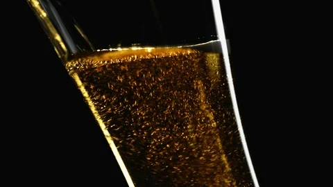 Misted mug of cold light kraft beer, drops flow down glass, filling up, bubbles Stock Footage 94584196