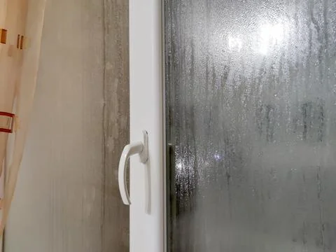 Misted plastic window due to high humidity Stock Photos