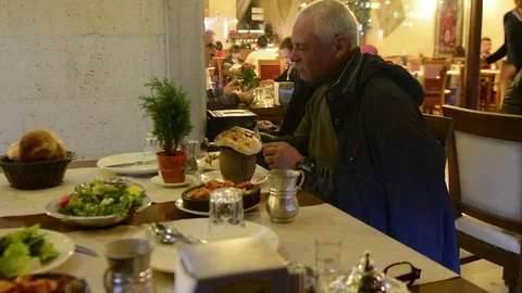 Mister eats at the cafe Stock Footage 83118012