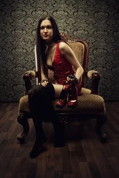Mistress in red Stock Photos