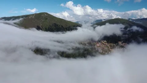 Misty Aerial View Of Mountain Village Stock Footage