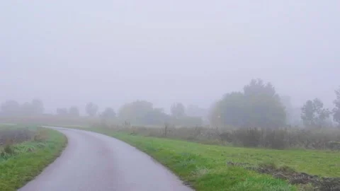 Misty bicycle path  in nature Stock Footage 141930550