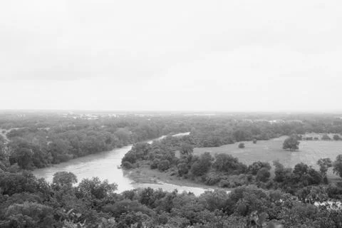 Misty black and white winding Texas river Stock Photos