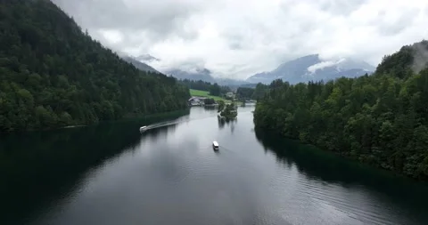 Misty clouded mountain lake. Dark grey mysterious rainy majestic spooky inland Video stock 222546693
