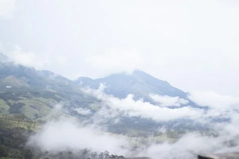 Misty clouds and the the mountain Stock Photos