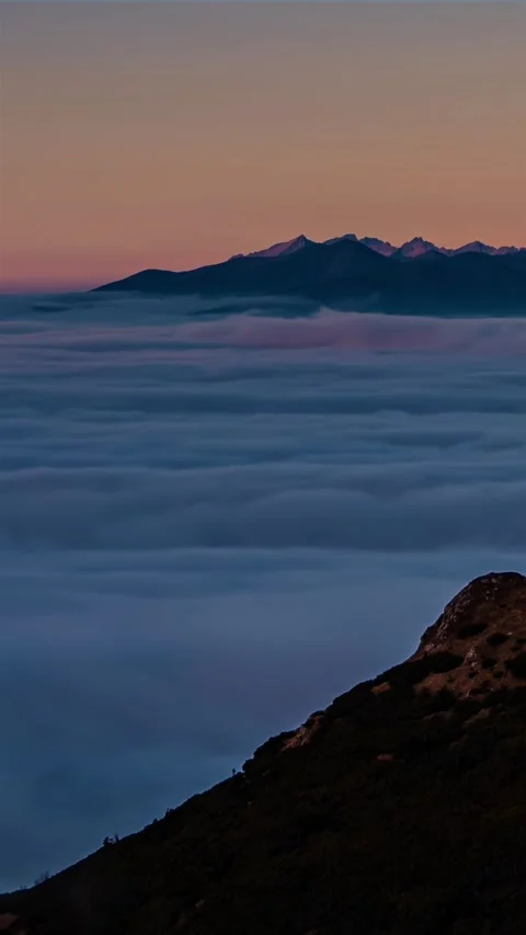 Misty Clouds Moving Fast in Mountain Valley Before Sunrise, Vertical Time Lapse Stock Footage 316260450