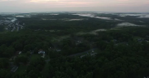 Misty Clouds Sit in Valleys Stock Footage 52137069