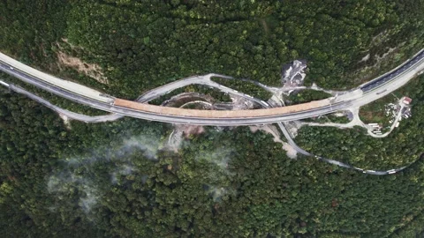 Misty Day Mountain Road Construction Maintenance Trucks Highway Bridge Stock Footage 237357804