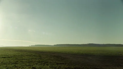 Misty Field and Barbed Wire Metal Fence in Morning Stock Footage 144652675