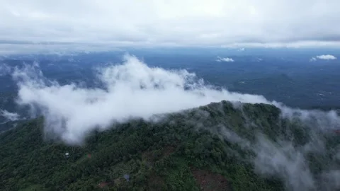 Misty Green Mountain Range with Rolling Clouds Stock Footage 312623603