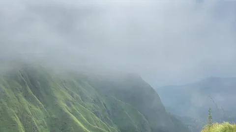 Misty Green Mountain Ridges with Thick Fog and Clouds Stock Footage 340435405