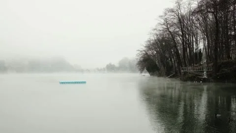 Misty lake with a floating swimming platform and ladder in calm natural Stock Footage 342025777