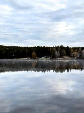 Misty Lake Landscape with Forest Reflection in Sweden Stock Photos