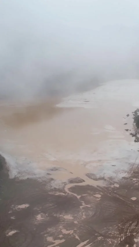 Misty Landscape with Brown River Water and Rural Dirt Path View Stock Footage 343992641