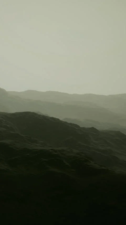 Misty landscape with layers of hills under soft light in the distance Stock Footage 336581231