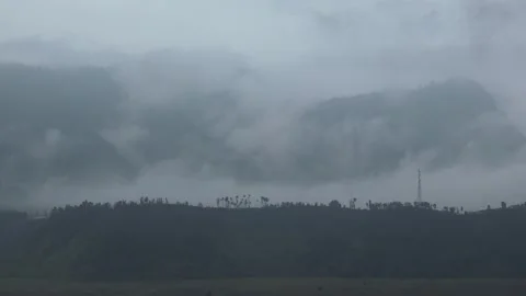 Misty landscape view of Mount Bromo volcano, serene natural beauty in Java Vídeos de archivo 312425641