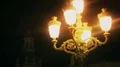 Misty medieval street lamp lighting dark night street, mysterious atmosphere HD Footage