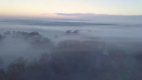Misty morning over fields Stock Footage 229202462