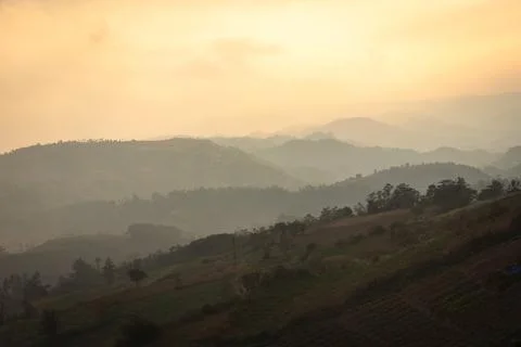 Misty mountain with cloudy dramatic sky at morning from flat angle Фото
