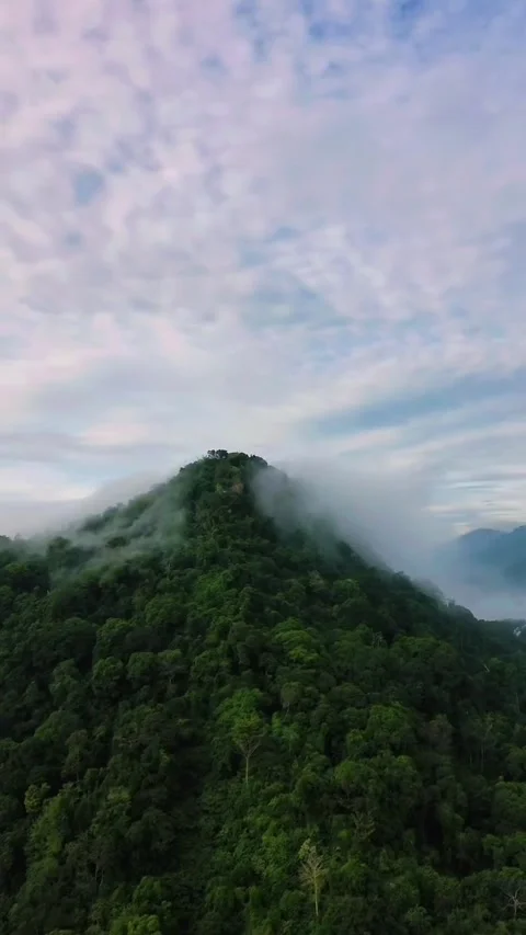 Misty Mountain Landscape with Clouds and Dramatic Sky Stock Footage 325384023