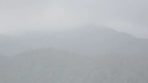 Misty Mountain Landscape Covered in Dense Fog with Peaceful Atmosphere - S Log 3 Stock Footage 306193245