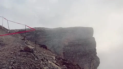 Misty Mountain Path with Safety Ropes on the Tibetan Plateau Tibet Stock Footage 339760146