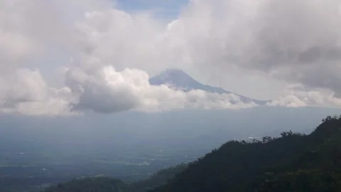 Misty Mountain Peak Above Clouds: Serene Blue Landscape With Summit And Sky Video stock 326768092