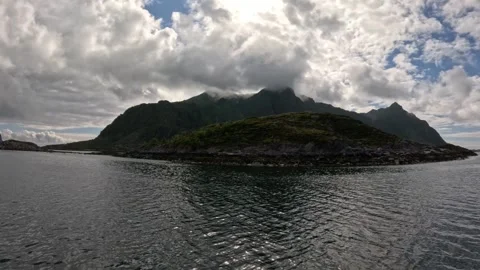 Misty mountain peaks with sunbeams over fjord island Lofoten 스톡 동영상 344047549