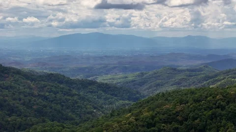 Misty mountain ridges under dramatic clouds in Chiang Mai region Stock Footage 309841154