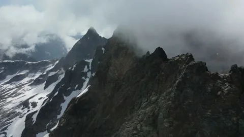 Misty Mountain Scene, Epic Views, Snow and Clouds, Drone Shot Stock Footage 169553751