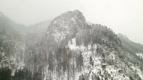 Misty mountain with snowfall Video stock 148389896