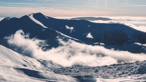 Misty mountains clouds time lapse cold sunny winter season alps nature landscape Stock Footage 170937754