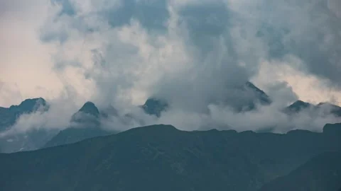 Misty Mountains – Dramatic Cloud Formation Timelapse in 4K Stock Footage 303958632
