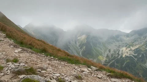 Misty Mountains – Dramatic Cloud Formation Timelapse in 4K Stock Footage 303959693