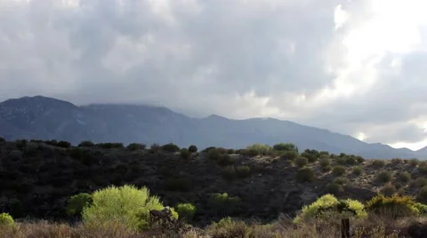 Misty Mountains, A timelapse of clouds coming over the top of mountains Stock Footage 54838041