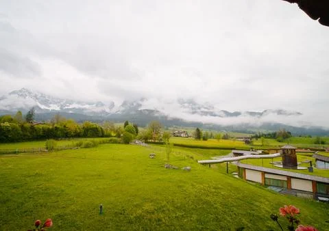 Misty mountains view from balcony of the accomodation. Stock Photos
