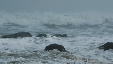 Misty Ocean Tide in Slow Motion Medium Shot Stock Footage 99754788