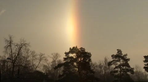 Misty rainbow over winter forest Stock Footage 52816375