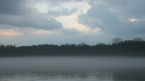 Misty river and forest with dramatic sky in the evening (FULL HD) Video stock 37013985
