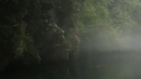 Misty river flowing through rapids. Movie like slow motion of free water rushing Stock Footage 302217378