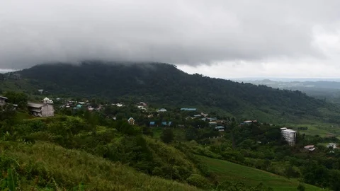 Misty sky floating on the mountains with forest and valley on the foregound Stockbeeldmateriaal 92936770
