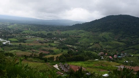 Misty sky floating on the mountains with forest and valley on the foregound Stockbeeldmateriaal 92936799