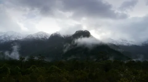 Misty snowy mountain time lapse Stock Footage 10733761