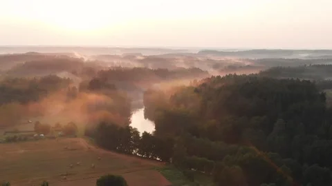 Misty sunset on the river by drone Stock Footage 146550204