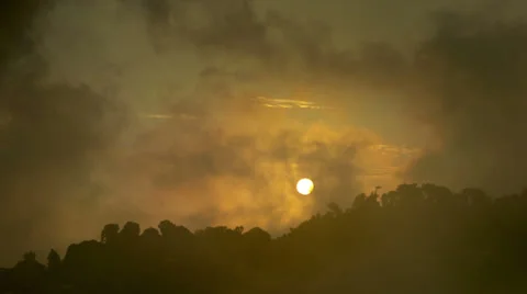 Misty sunset time lapse Stock Footage 34911692