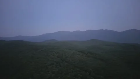 Misty Twilight Over Rolling Hills Stock Footage 328964716