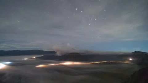 Misty volcanic Mount Bromo timelapse clip from night till sunrise, Indonesia Stock Footage 106279624